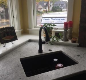 newly remodeled kitchen by premier plumbing in michigan during fall