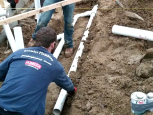 laying pipe at site of new construction